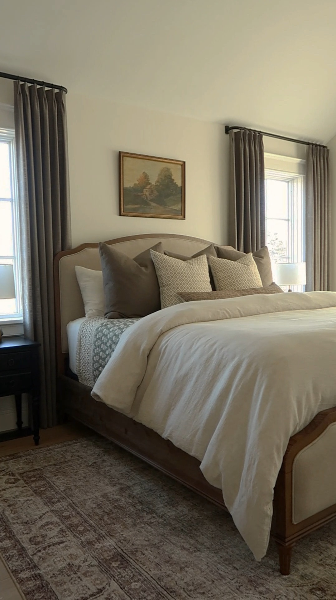 These curtains by @TwoPagesCurtains have completely LEVELED UP my bedroom! I can’t say enough good things about them. They are stunning and beautifully made. Exact details below:

Use Code: AMANDADOUCETTE for 15% discount! 

- Product name :  Liz Linen Drape Pleated
- Color :  Sepia Ebony 1908-14
- Header style :  Pinch Pleat
- Single panel width and length in inches : 28" W x 96" H
- Liner type : Room Darkening 70-80%
- Memory Shape (yes or no) : Yes 


#LTKItBag #LTKHome #LTKWatchNow