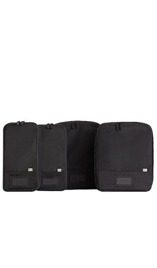 BEIS The Compression Packing Cubes 4pc in Black. | Revolve Clothing (Global)