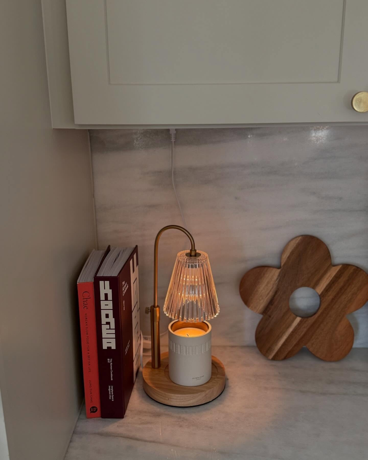 Still a WIP, but these kitchen corners that make me so happy 🇰🇷❤️ Also I learned about candle warmers when a dear friend gifted us one as a housewarming gift, and it is a game changerrrr!

Kitchen styling, candle warmer, kitchen pulls, brass kitchen hardware, fruit bowl

#LTKHome