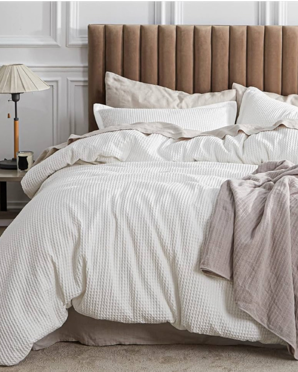 Classic Home Decor: This Bedsure cotton duvet cover set has been crowned ELLE EDITOR'S CHOICE 2024 for Best on Amazon luxury duvet cover. This award-winning duvet cover set features a timeless waffle texture in classic solid colors, which adds a relaxed yet elevated look to your year-round bedding.
Soft and Puffy Comfort: Made of 100% natural cotton, this textured duvet cover set is ultra soft and breathable. The cotton waffle woven texture on the surface creates a touch of plush thickness, while the cotton percale on its reversed side makes the duvet cover breathable and gentle.
Thoughtful Details: Eight inside corner ties and the hidden button closure ensure a secure fit to prevent the filling from bunching. A spare button is included to ensure extra peace of mind against wear and tear. Comes packaged in a reusable fabric tote bag which is useful for grocery shopping.
A Perfect Gift for Your Loved Ones: Give the gift of coziness and elegance to your loved ones, whether it’s for Mother’s Day, Valentine’s Day, Christmas, or just to show you care.
Enhanced Durability: The cotton fabric's dimensional waffle weave texture offers increased wrinkle-resistance. This Bedsure duvet cover set is machine-washable and gets even softer (without shrinking or wrinkling) after each wash.
What You Get: This Bedsure cotton king size duvet cover set comes with 1 duvet cover (104" x 90") and 2 pillow shams (20" x 36").