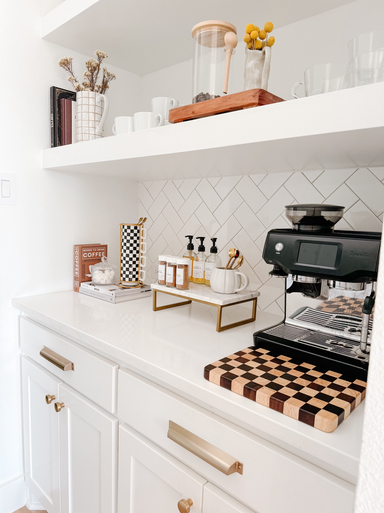 Coffee bar essentials 

Checkered cutting board, espresso machine, checkered mugs, apothecary syrup bottles, marble riser, pitcher, organic modern, 

#LTKSaleAlert #LTKHome #LTKStyleTip