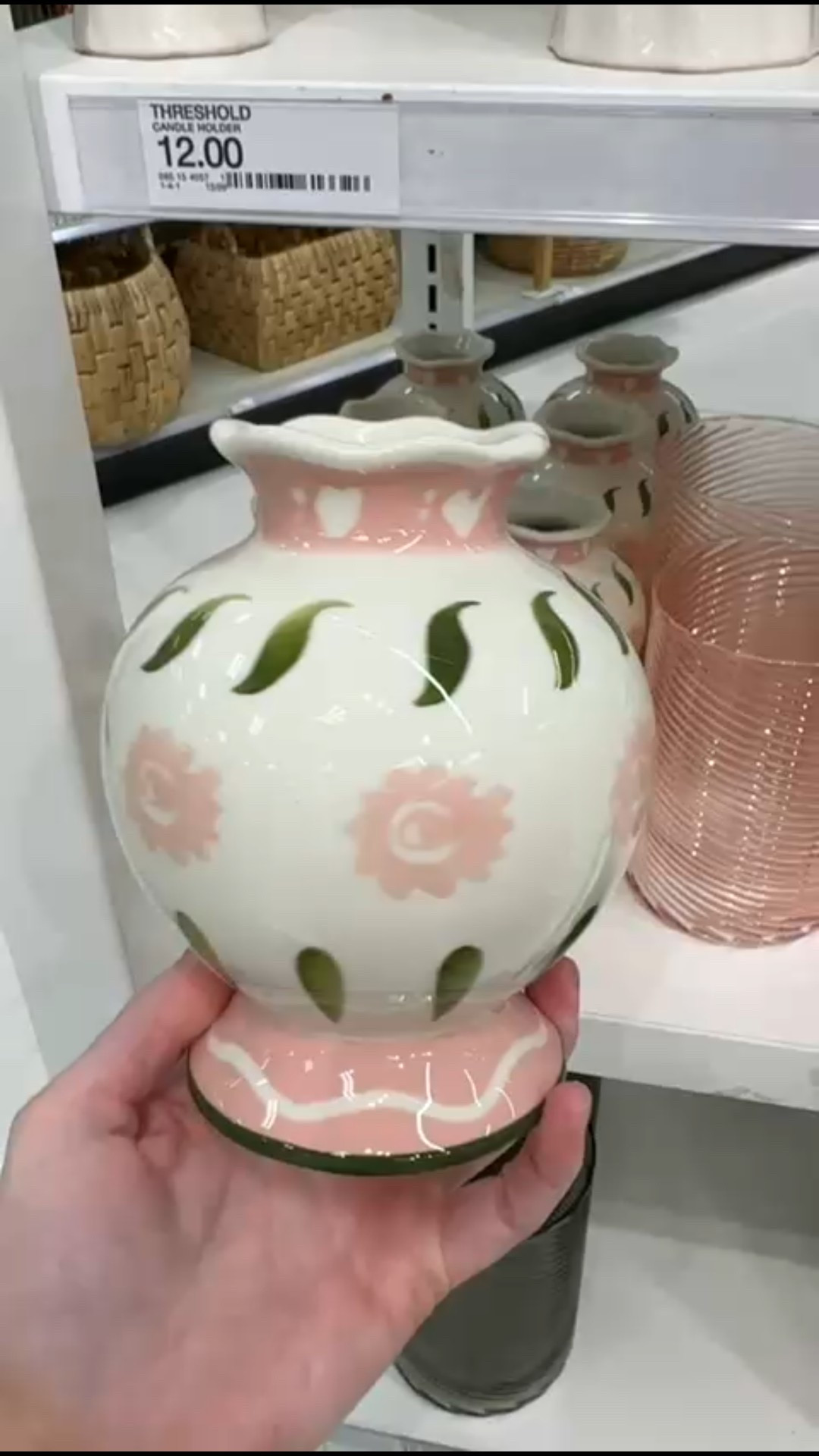 A vintage-style ceramic vase featuring soft pink floral motifs and green leaf detailing on a creamy white base.

#LTKHome