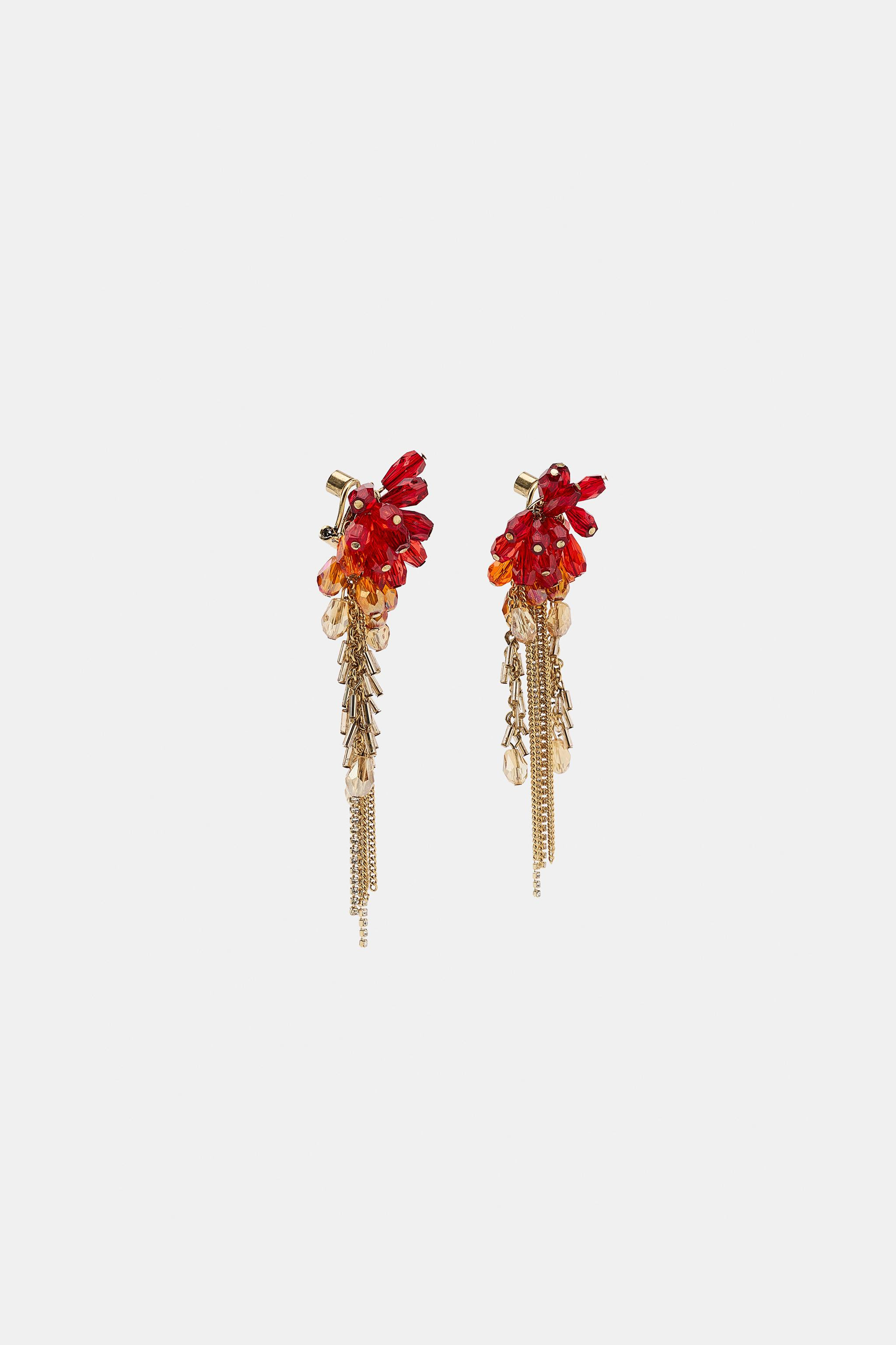 Multi-piece earrings made of colored crystal. Metallic fringe drops. Butterfly clip closure. | Zara US