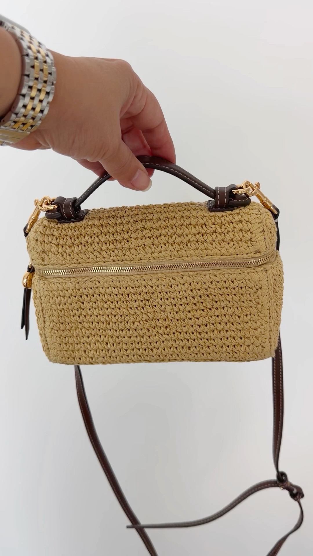 The cutest raffia crossbody bag that’s perfect for vacation outfits beach, resort wear, and everyday summer outfits. This Tory Burch bag has been a favorite this season and goes with just about everything! You can also remove the long strap and use it wth the top handle as a clutch bag.

#LTKTravel #LTKOver40 #LTKSeasonal