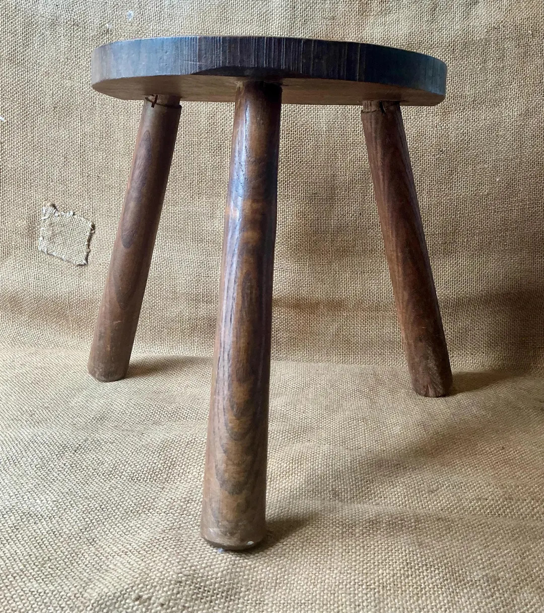A vintage French oak tripod milking stool | Etsy (US)