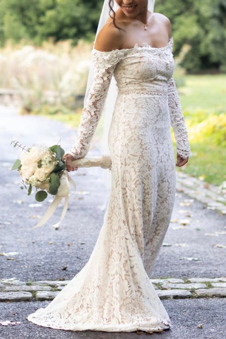 This lace off the shoulder wedding dress is under $150 and amazing! 

#LTKwedding