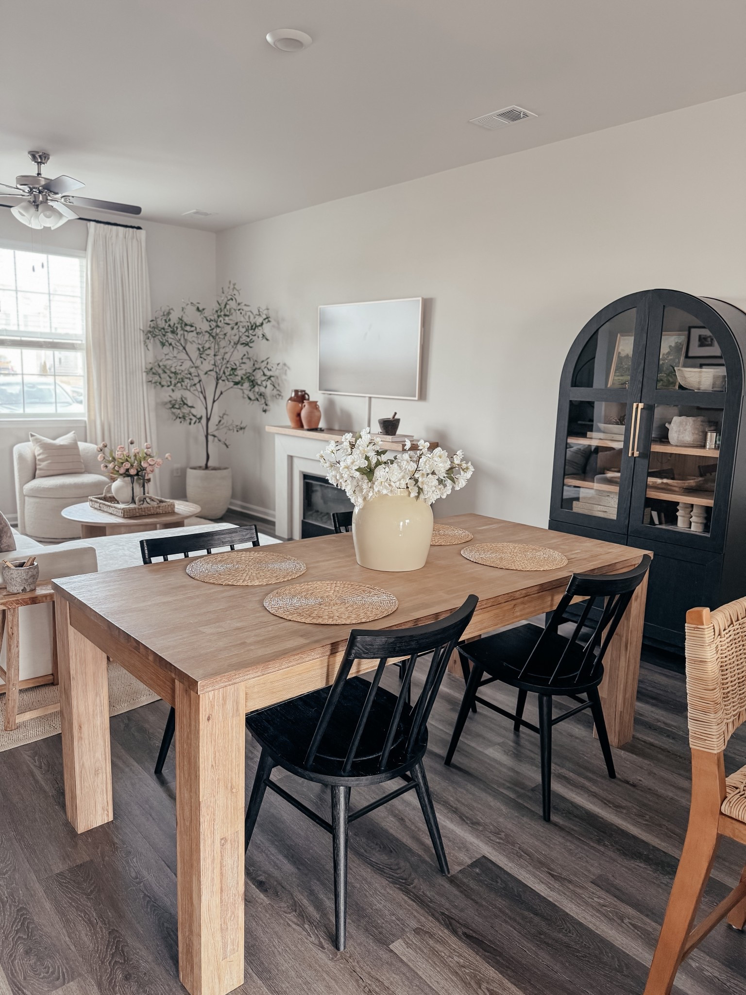 Small kitchen space Inspo in an open floor plan ✨

Solid wood kitchen table • black dining chairs • pottery barn • Wayfair • Walmart arch cabinet • viral arch cabinet • woven placemats • organic home • earthy • neutral home

#LTKHome #LTKSaleAlert #LTKSeasonal