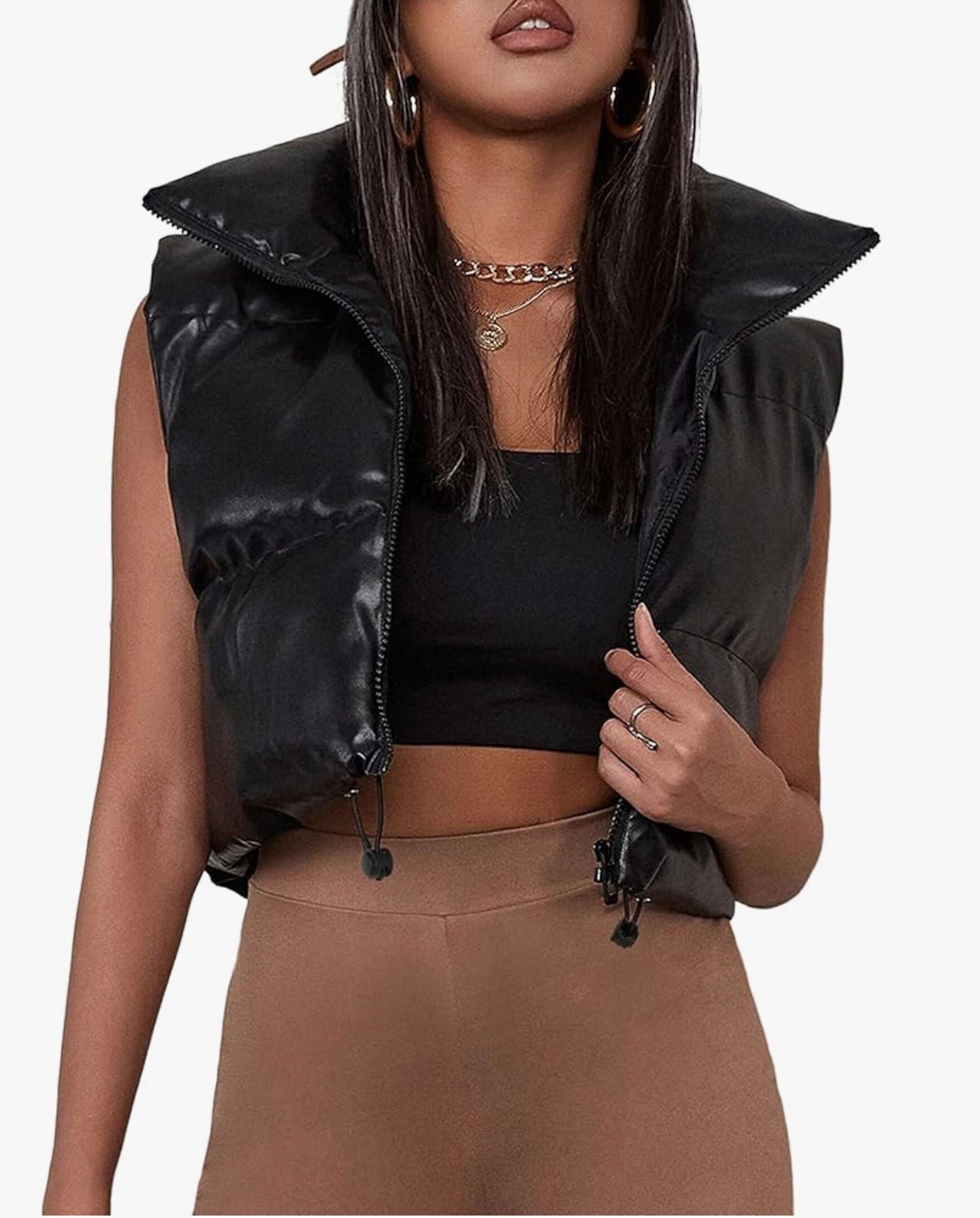 This cropped black puffer vest is my go-to layer right now. 🤍
Perfect over a fitted long sleeve or hoodie, lightweight but warm, and hits at the perfect spot so it doesn’t make you look boxy.

#LTKSeasonal #LTKootd #LTKmomlife