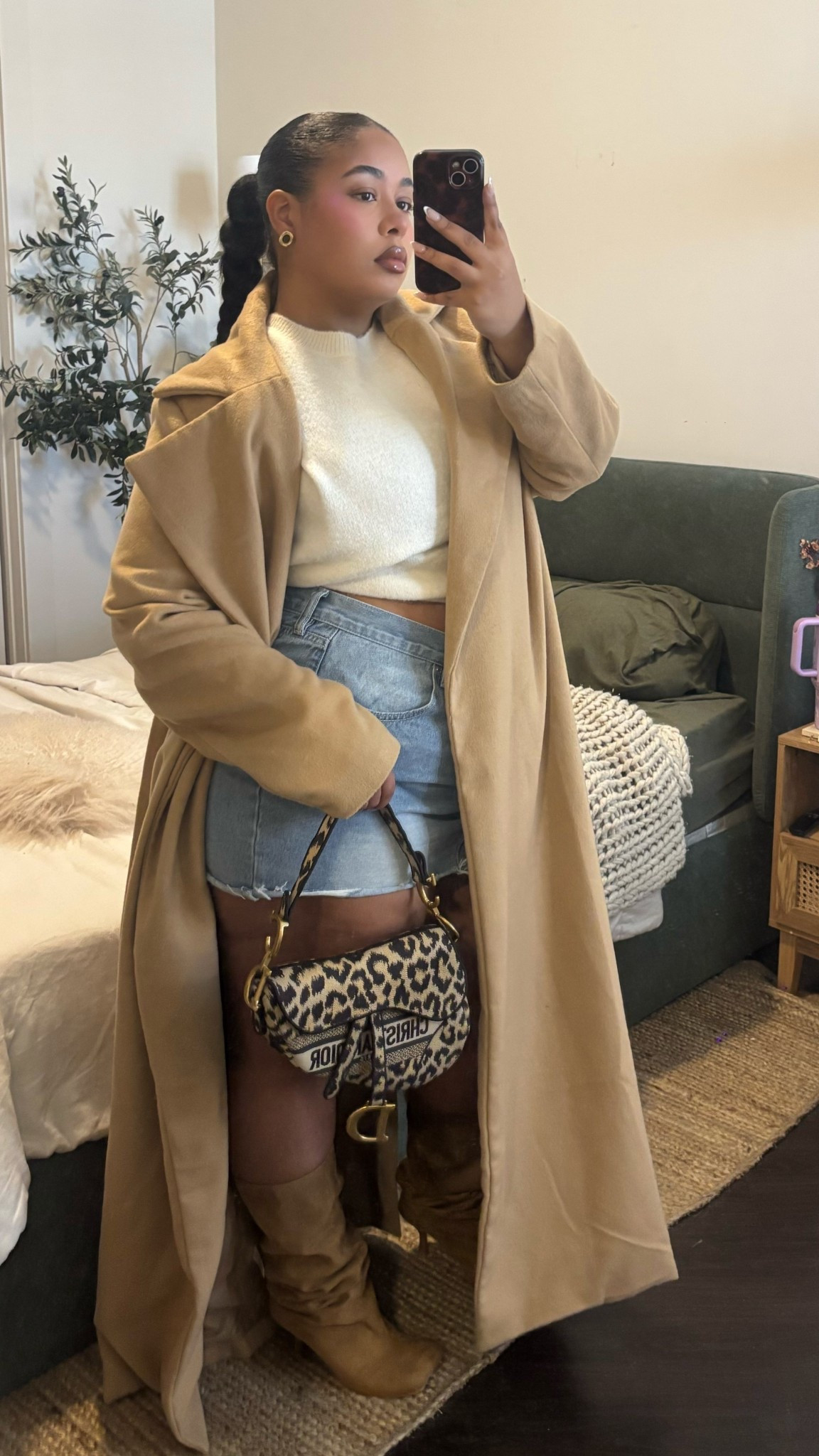 Top from ASOS 
Exact trench coat & mini skirt from Fashion Nova 
Exact boots from Amazon but can also be found on TikTok shop 

#LTKMidsize #LTKootd