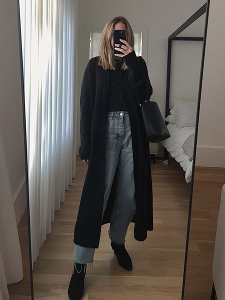 Black sweater duster / jeans / boots — 