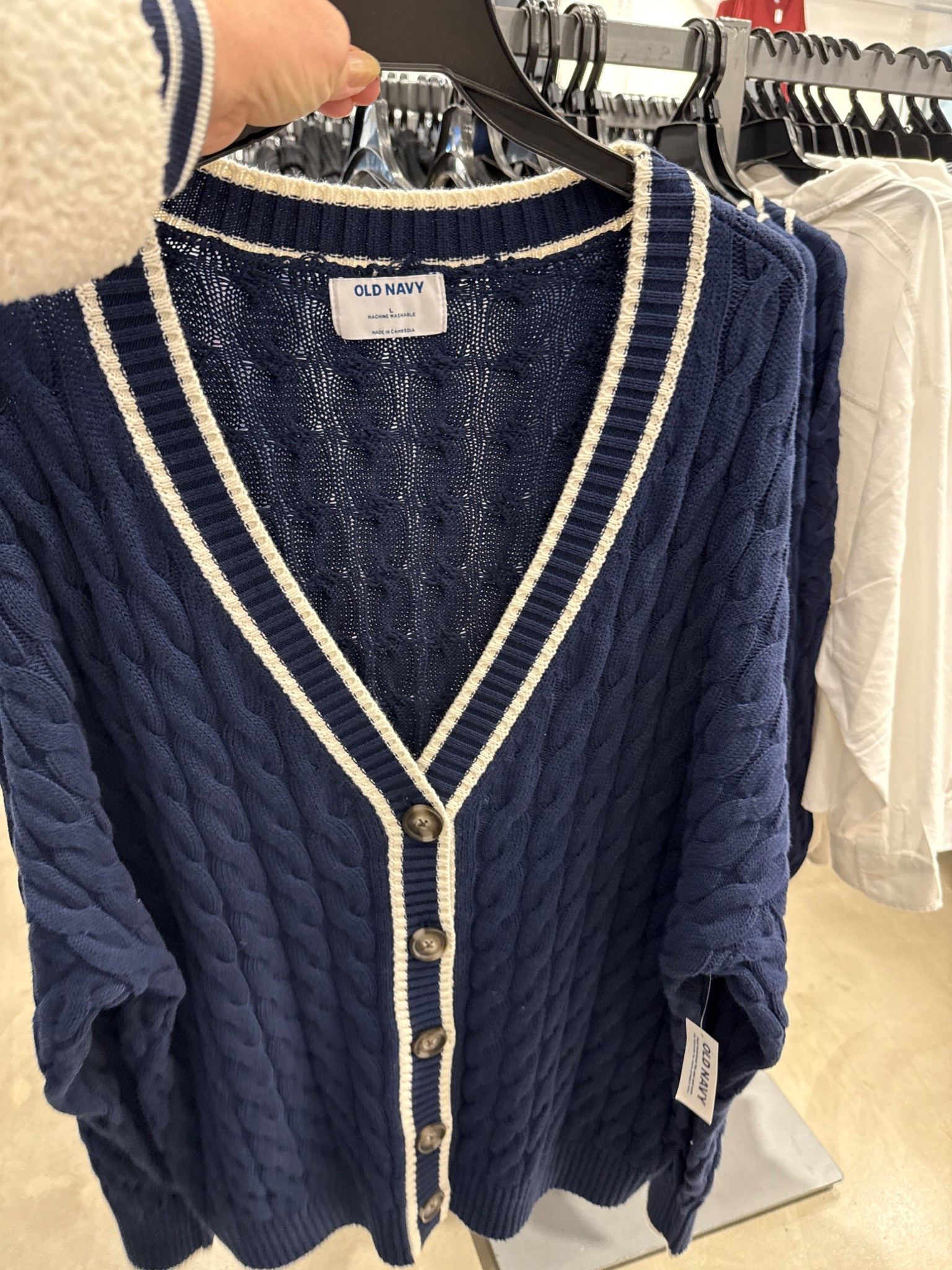 Fell for this cardigan at Old Navy. It’s so warm and soft. Wear it buttoned or open. It’s a dark navy cardigan with white stripes. Comes in other colors .

#LTKHoliday #LTKFindsUnder50 #LTKSaleAlert