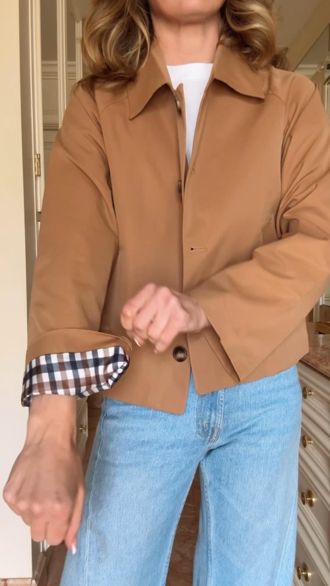 Easy spring outfit. Cute short trench coat with cute sleeve detail. Spring jeans from mother. Run a little large. Wearing size 25. Too and jacket are Amazon finds!