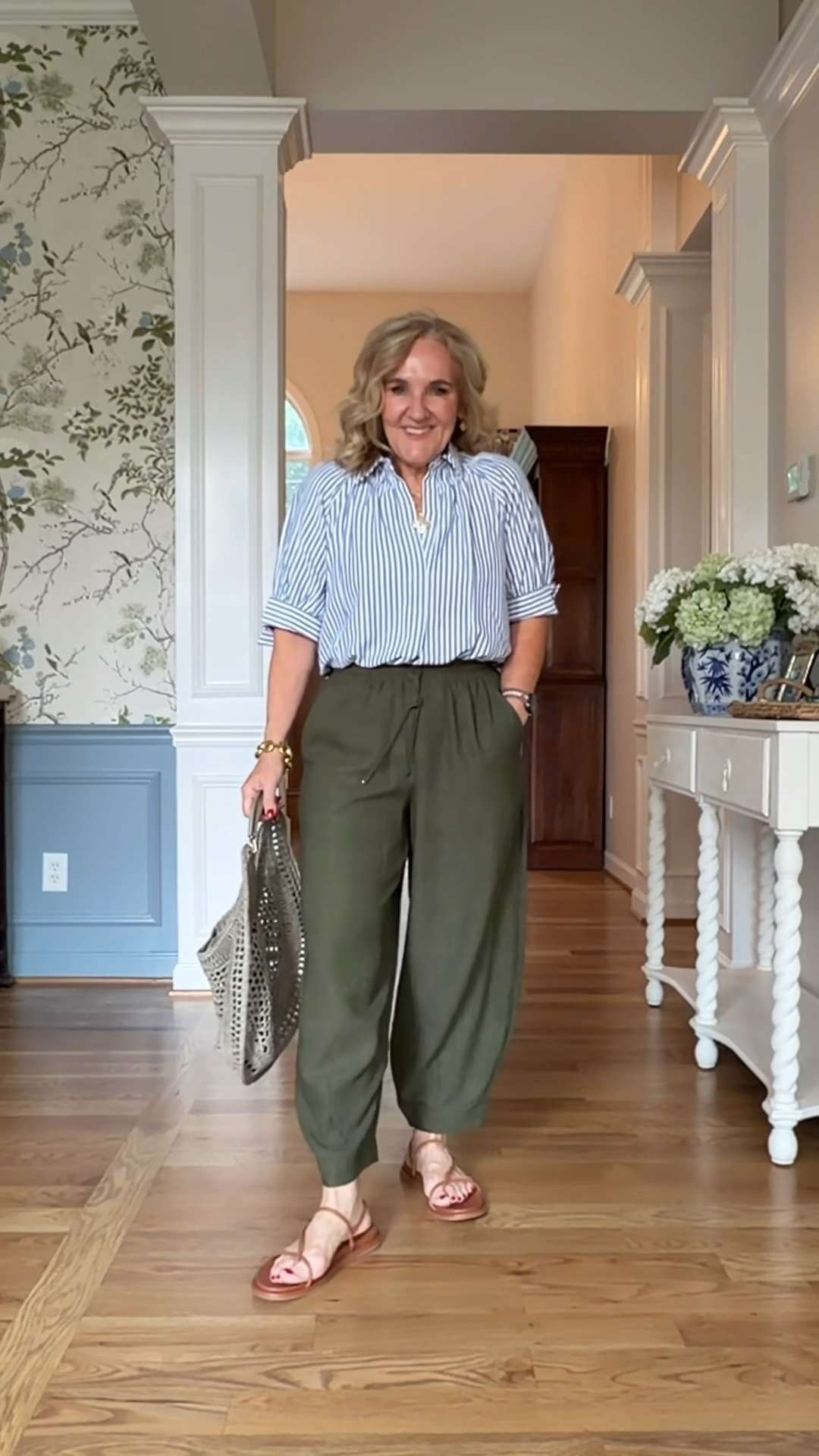 Lightweight, breathable, and so comfortable for hot days, they give you that relaxed look while still feeling put together. I paired them with a striped button-down and simple sandals for an easy outfit that works for errands, lunch dates, and travel days. 

 #LTKootd #LTKSeasonal #LTKOver40