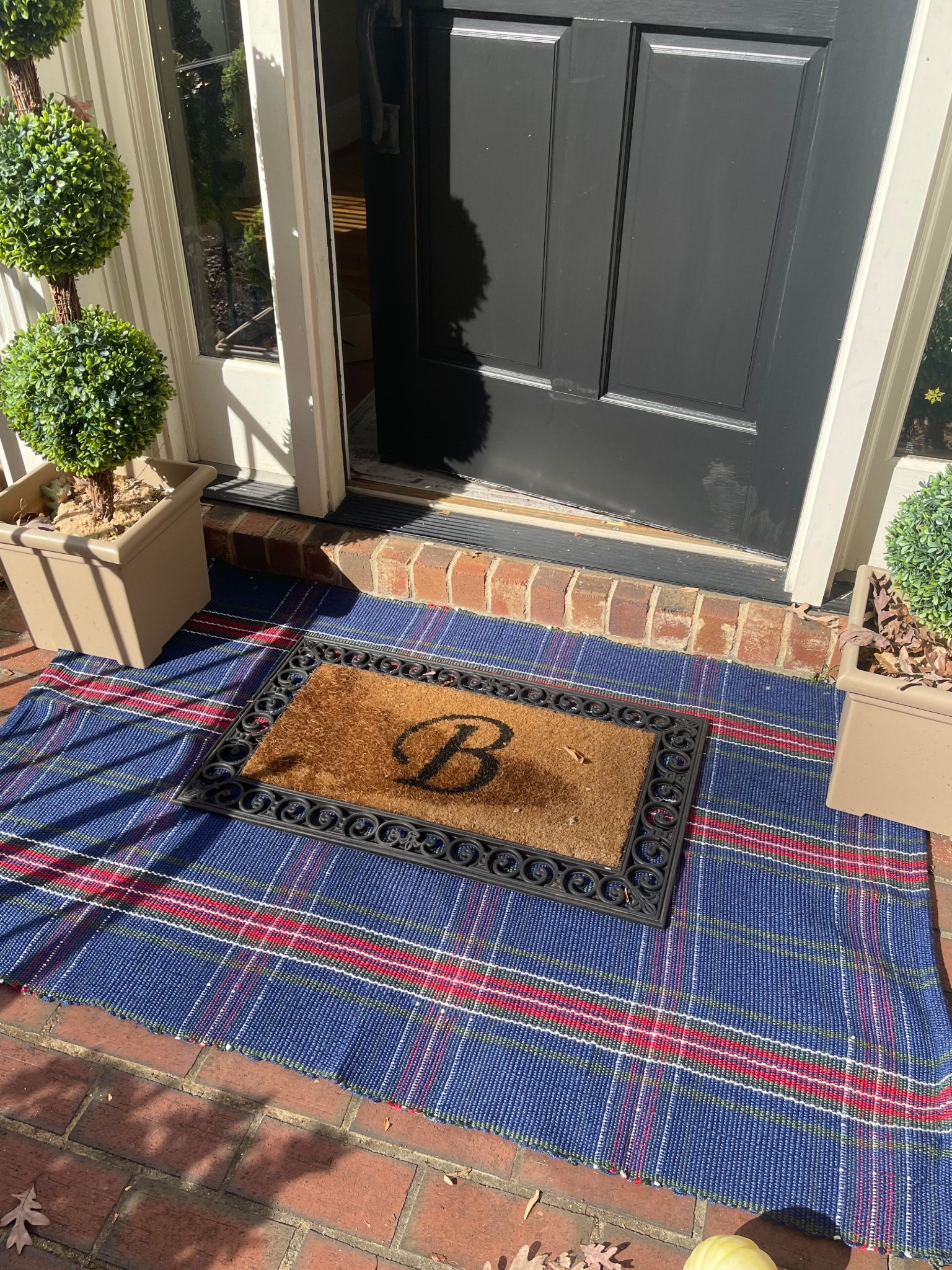 ✨Classic Christmas Front Porch Decor✨

Bring a cozy, traditional holiday feel to your front door with this timeless Christmas porch styling! 🎄💚 I layered the navy tartan plaid rug underneath our monogrammed doormat for that classic prep vibe, and paired them with these gorgeous triple ball topiaries for height and symmetry. The star of the porch is the Norfolk-style wreath with the deep red velvet ribbon — simple, elegant, and so perfect for Christmas. 🎀🌲 Everything is super affordable and easy to recreate!

Navy tartan rug, evergreen Norfolk wreath, artificial topiary trees, and our monogram “B” doormat are all linked so you can shop this whole front porch moment.✨

💫 Perfect for the holidays, Christmas hosting, and creating a warm seasonal welcome!

🎄✨ navy plaid rug • holiday front porch decor • Christmas wreath • outdoor Christmas decorations • classic Christmas porch • layered doormat look • artificial topiary trees • front porch styling • neutral Christmas entryway • Walmart Christmas finds • Amazon home decor • monogram doormats • festive front door décor • cozy holiday home styling ✨🎄

#LTKHome #LTKHoliday #LTKFindsUnder50

#LTKFindsUnder50 #LTKHome #LTKHoliday