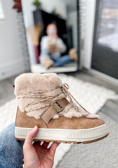 This style of winter boots are going to be trending again this year. Loving these more than I though I would. Super comfortable and so soft. Strap is adjustable.
(If between sizes then size up)

Winter boots • Faux Fur Boots • Moon Boots • Ugg Inspired Boots • Womens Boots • Winter Trending • Neutral Boots 

#winterboots #moonboots #ugginspiredboots 

#LTKstyletip #LTKshoecrush #LTKHoliday
