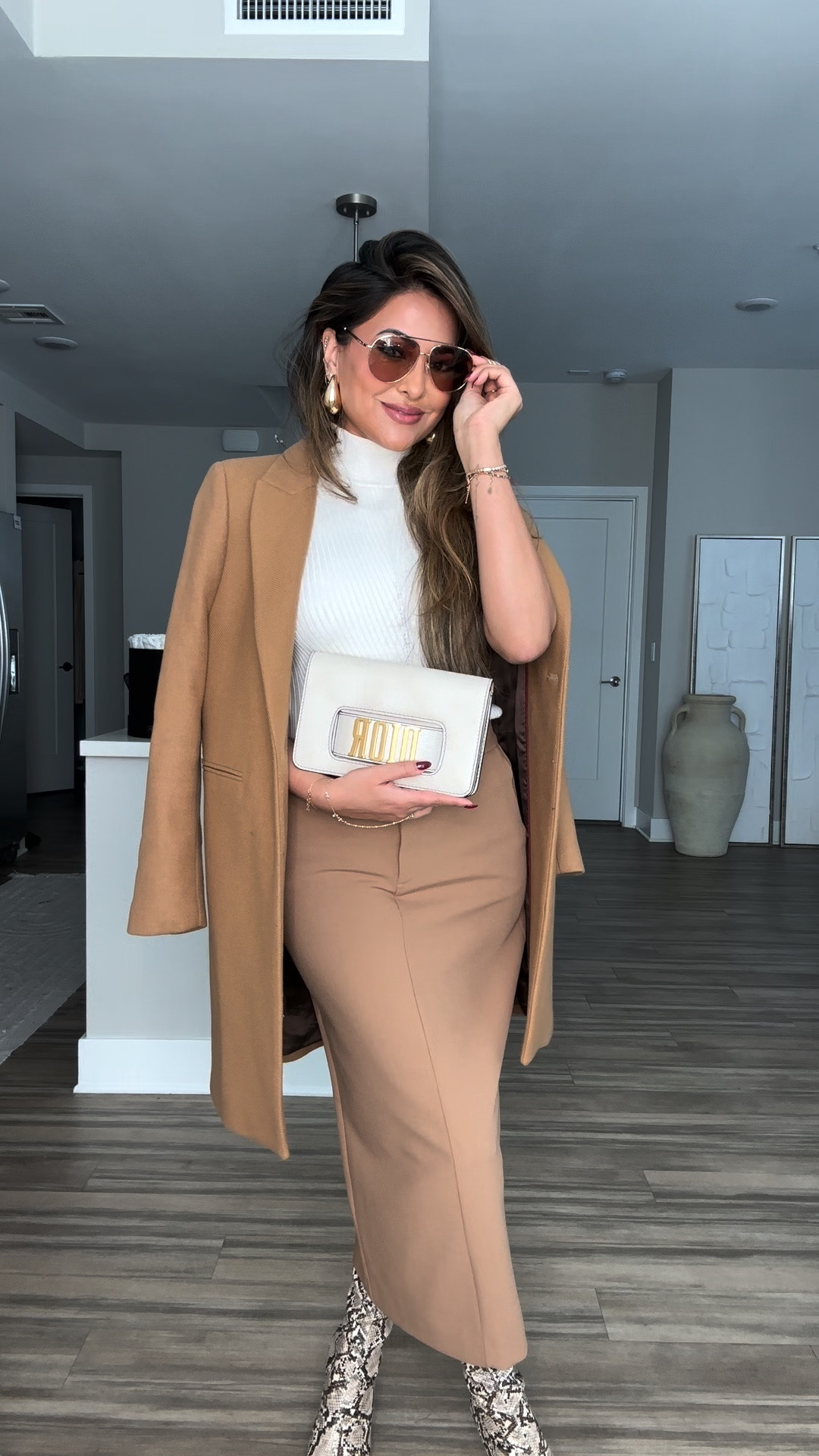 GRWM: Styling A Midi Skirt & Snake Print Boots  💫

• #outfitinspo #fashion #styletips #outfitideas #grwm #fashionstyle #styling #todaysoutfit #todayslook #fallfashion 


Outfit Details:
top — @guess x @marciano 
skirt — @aritzia 
boots — @mango 
hand chain — @revolve 
bag — @dior 
perfume — @viktorandrolf 
earrings — @amazonfashion 
lips — @charlottetilbury

#LTKbeauty #LTKfindsunder50 #LTKstyletip