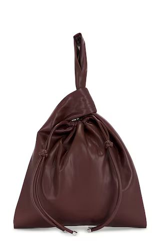 Nanushka Jen Drawstring Bag in Plum Chutney from Revolve.com | Revolve Clothing (Global)