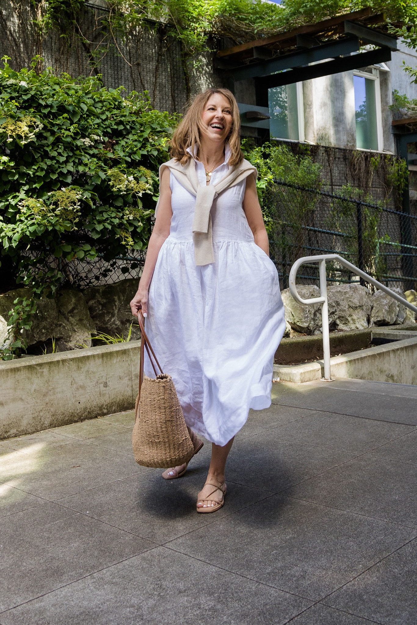 Lunch date! I'm wearing the new Daphne dress by Frank & Eileen.  I've layered my favorite cashmere sweater by J.Crew over my shoulders just in case it's cool inside the restaurant. I’m also wearing a comfortable barely there sandal and carrying a raffia bag.  