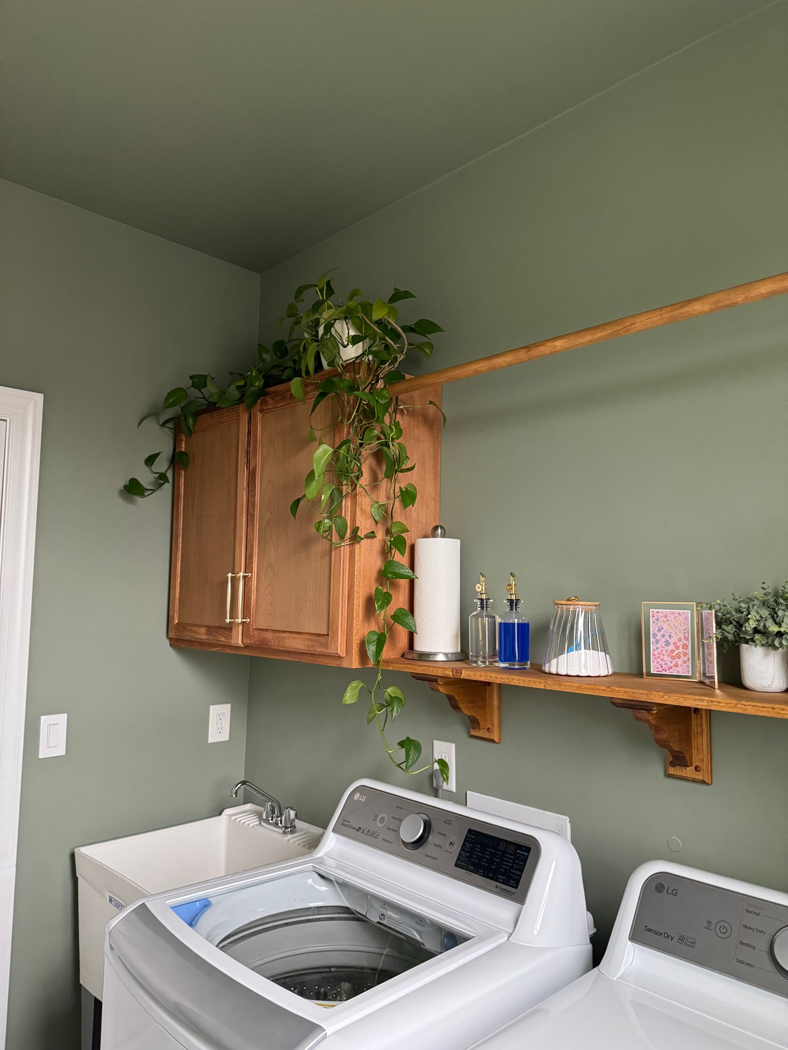 So obsessed with how our laundry room makeover turned out!! 🥹🌿🧺🤍
Paint color is SW Green Onyx & stain is Varathane Golden Oak

#LTKfindsunder100 #LTKfindsunder50 #LTKhome