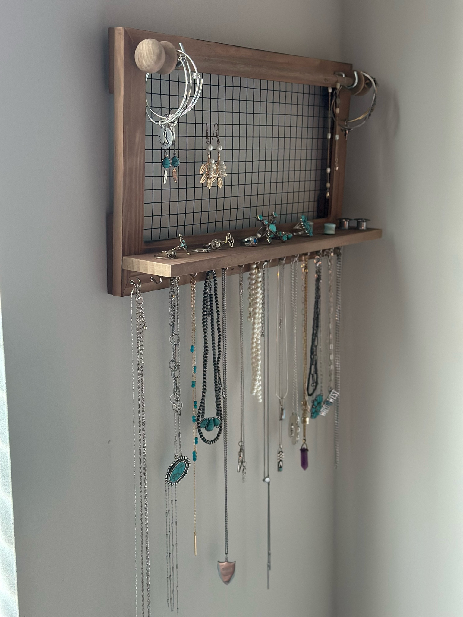 My favorite jewelry organizer I’ve found that matches the western aesthetic. Super cute and inexpensive! Also easy to mount (I used thumb tacks and it’s held up fine!)

#LTKstyletip #LTKfindsunder100 #LTKfindsunder50