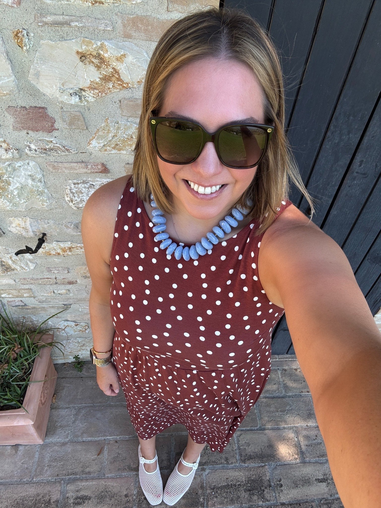 Polka dots are a must in Europe for me! I just love them so much and the brown print feels like the perfect transition into fall. I paired the brown with my light blue necklace and I love this color combination so much!

#LTKootd #LTKMidsize #LTKTravel