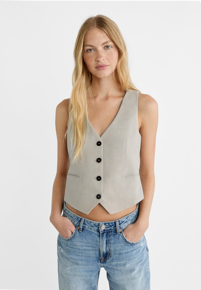 Kurze Weste mit Knöpfen - Mode für Damen | Stradivarius Deutschland | Stradivarius DE