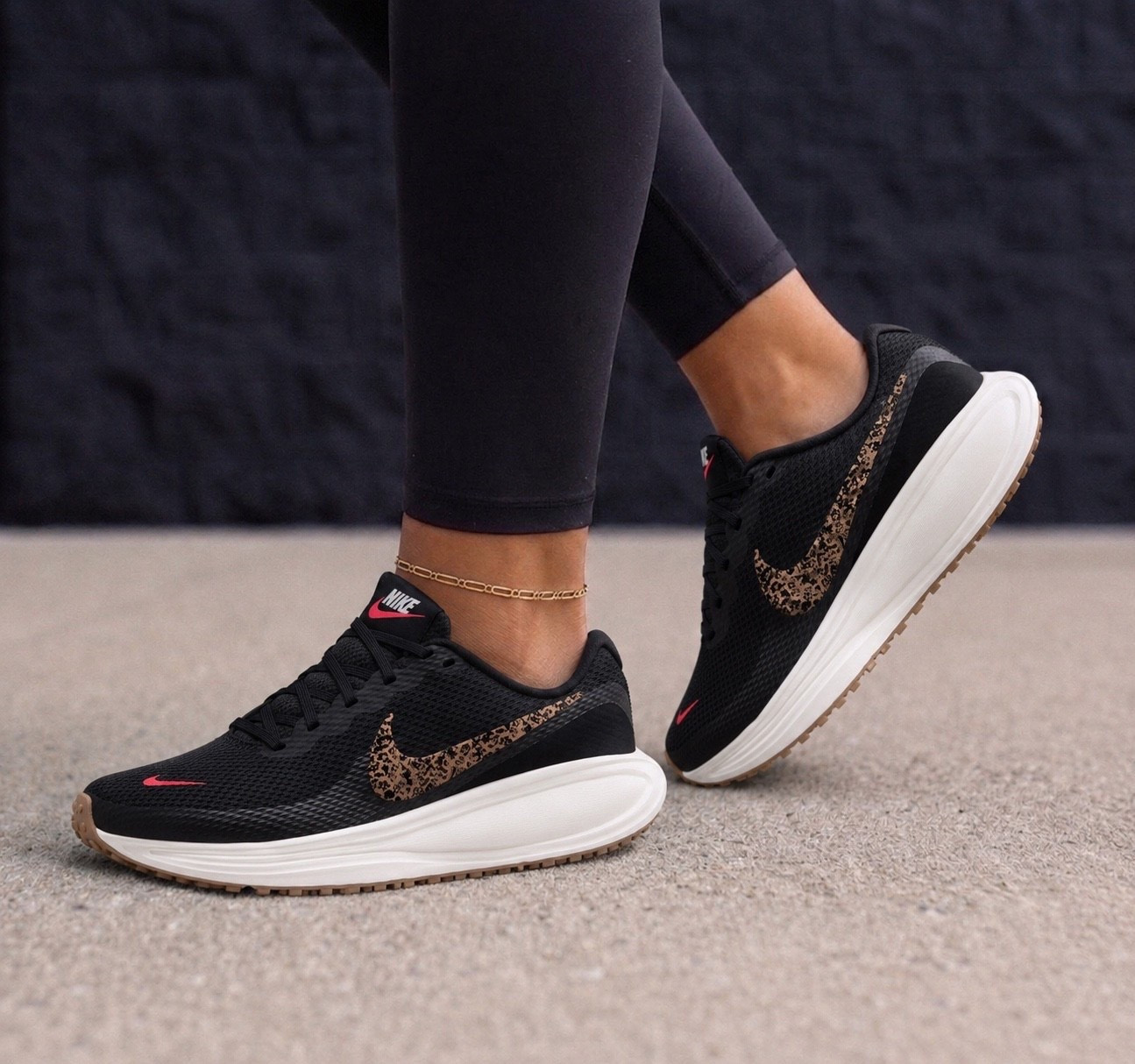 Nike revolution 8 leopard womens road running sneakers runs true to size