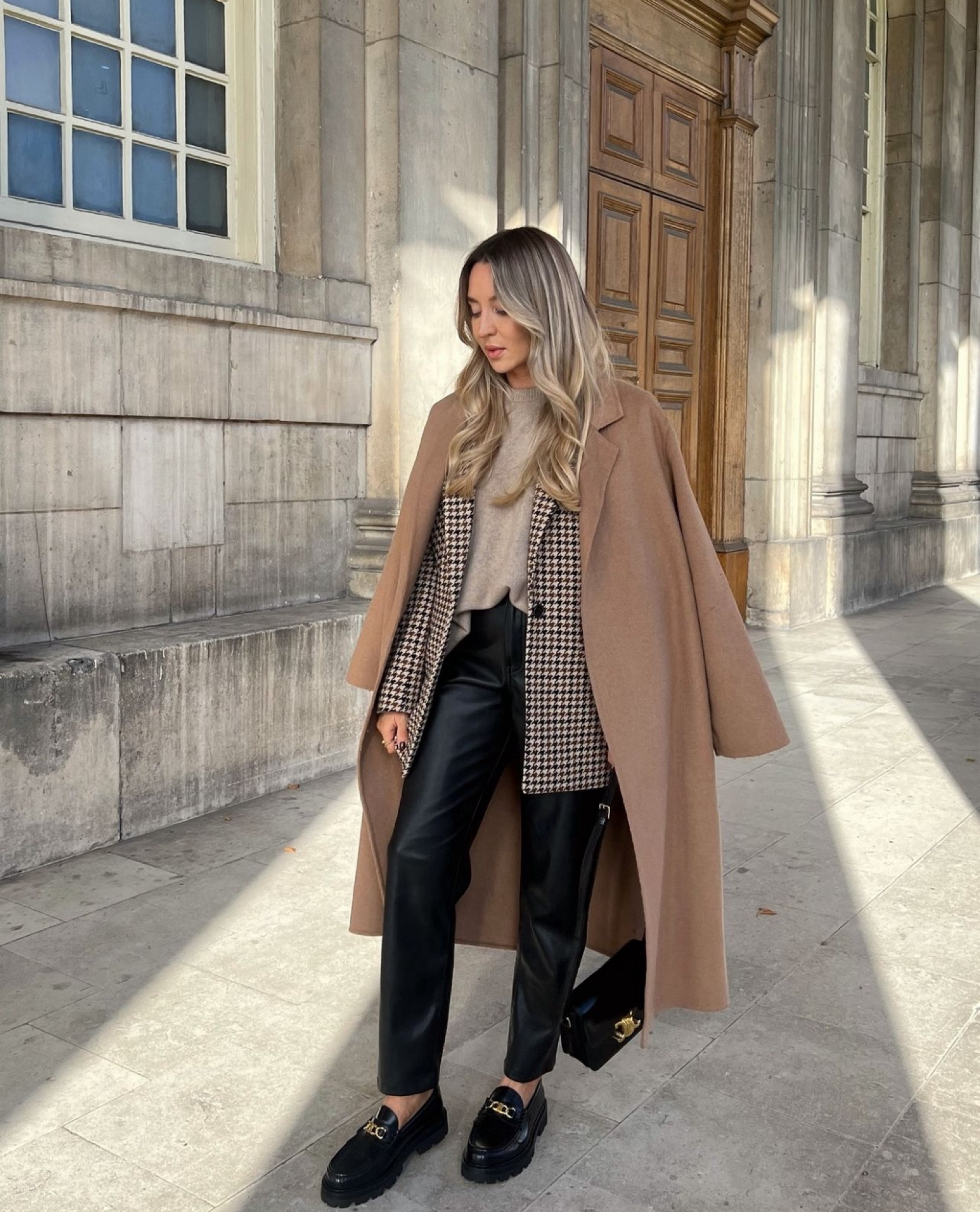 All the beautiful autumn tones 🍂 camel, tan and beige, wool coat over a houndstooth checked blazer, styled with a beige chunky knit jumper, leather trousers and Celine accessories 

#LTKautumn