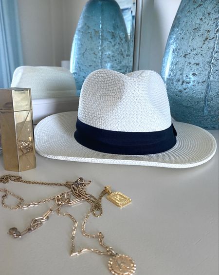 On my dresser. A packable straw beach hat, my favorite fragrance, and gold initial necklaces for layering. 
kimbentley, summer outfit accessories, bedroom, Baccarat Rouge, Amazon, travel

#LTKtravel #LTKswim #LTKSeasonal