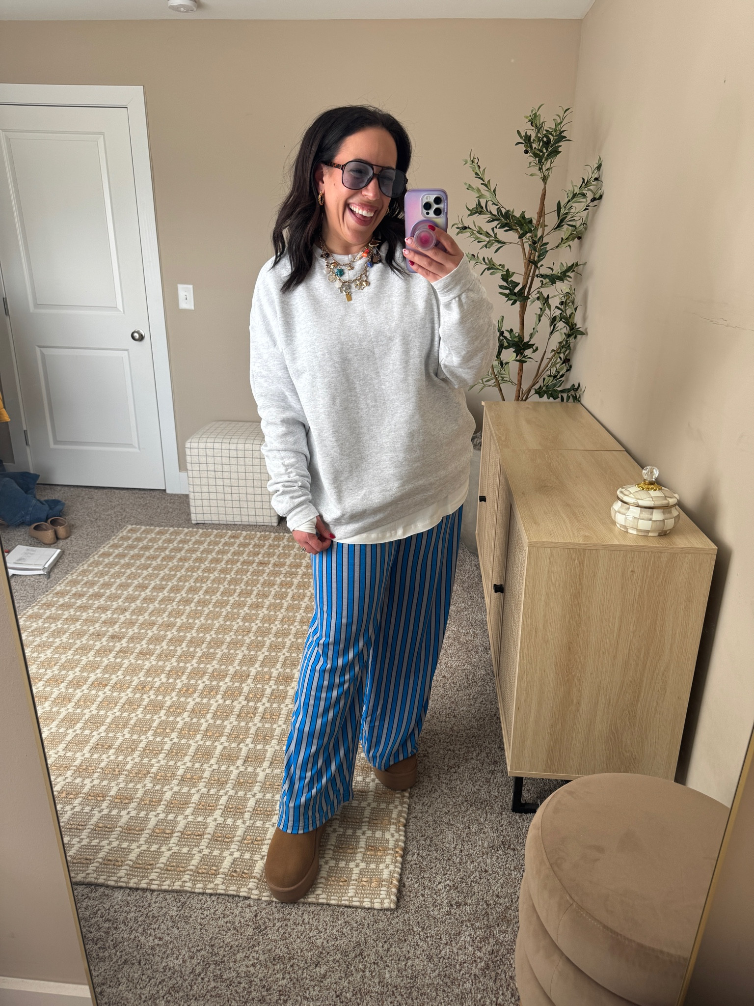 Amazon outfit of the day! 
Pants: XL 
Sweatshirt: XL
Long white tee: Medium 
Mini uggs size up one size! 

#LTKFindsUnder100 #LTKStyleTip #LTKMidsize