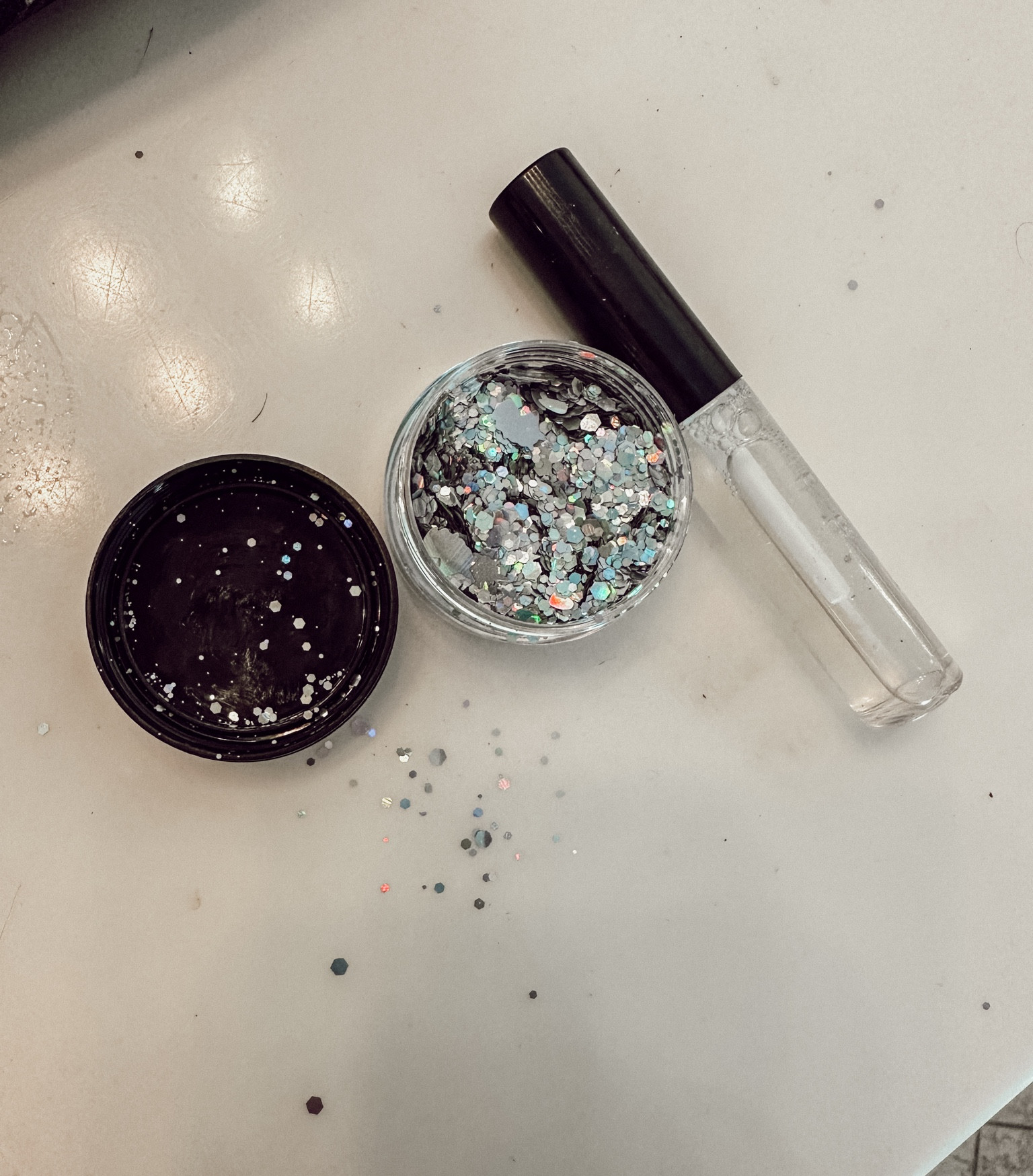 This glitter was SO GOOD. I got so many compliments on it for the Taylor Swift Eras Movie. I'm also going to use it for my alien Halloween costume. It actually comes with two containers of glitter and one adhesive. The glitter is chunky and super pigmented so a little goes a long way. Comes in so many colors for such a good price.

#LTKbeauty #LTKHalloween