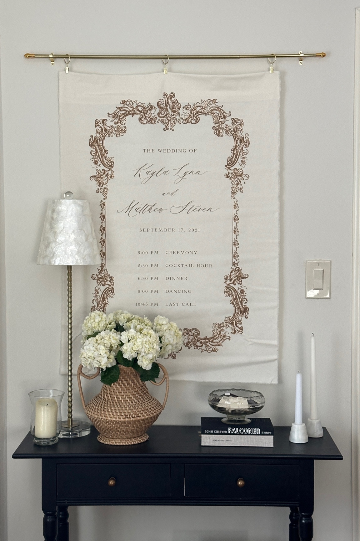 One of my favorite spots in the house is this area in my dining room! We filled this empty wall was this functional yet beautiful console table that was so easy to put together and also was so affordable. Above it we hung our fabric wedding timeline on a cafe curtain rod and it’s so special! I change out the timeline with custom fabric menus when we’re hosting and it’s become such a personalized fun area in our home. Plus, everything was so affordable!

#LTKhome #LTKfindsunder50 #LTKparties