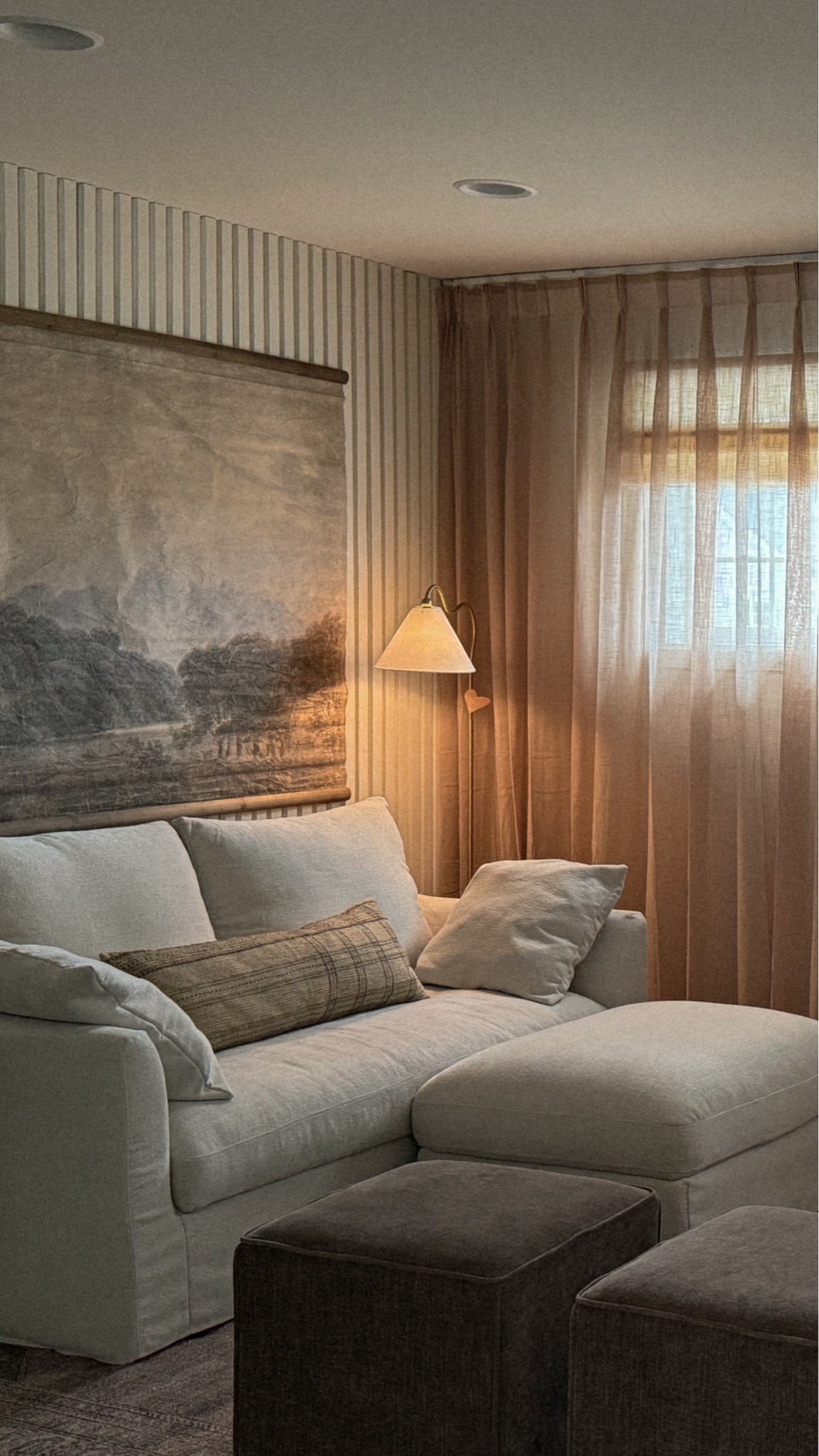 POV you finally added the curtains 

For three years I didn’t know what I should do with this wall. It’s small & so are the windows. & then I thought what if we add wall to wall curtains & the cozy vibe was instant. 

Curtains deets: @twopagescurtains 
Flynn Airy Collection in color Light brown
Liz Linen Cordless Roman Shades in color ivory white. 
Leo single wall & ceiling track
