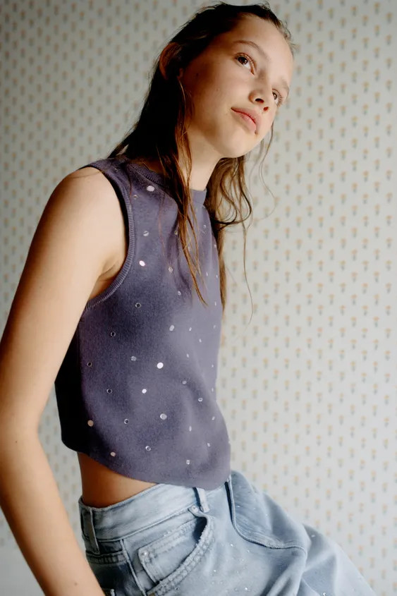 Knit top with a round neck and sleeveless design. Featuring mirror appliqués on the front.Model ... | Zara US