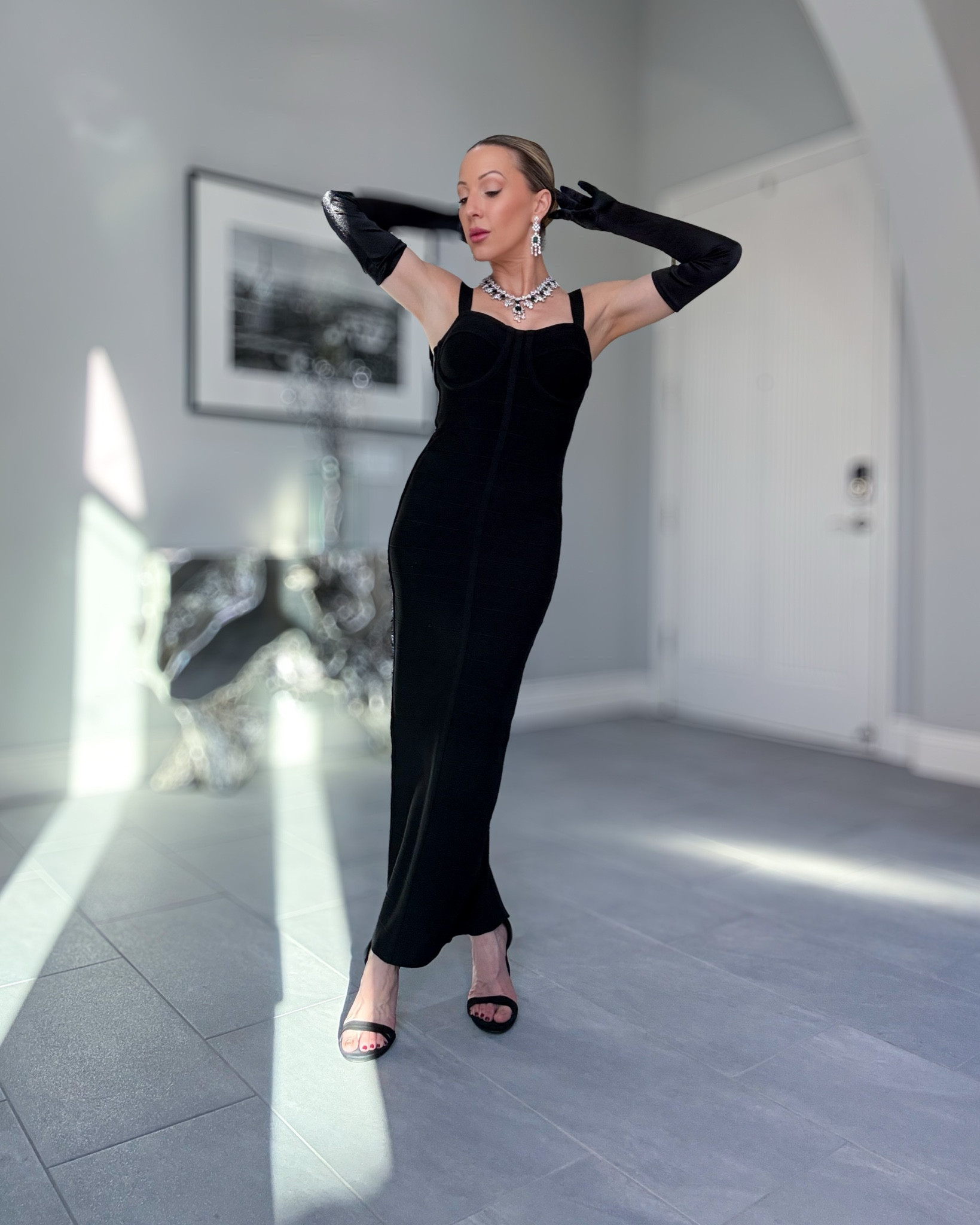 Holiday party dress, holiday outfit, Christmas party dress, black tie dress, gala dress, black bandage dress (styled with black suede strappy heel sandals and black satin evening gloves). 

#LTKParties #LTKHoliday #LTKStyleTip