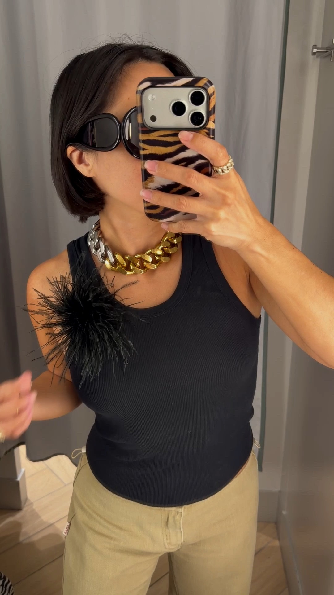 Slap on a feather brooch from Amazon to spice up your plain tanks!! Necklace is old from the H&M x Stella McCartney collab.

#LTKootd #LTKPetite #LTKSeasonal