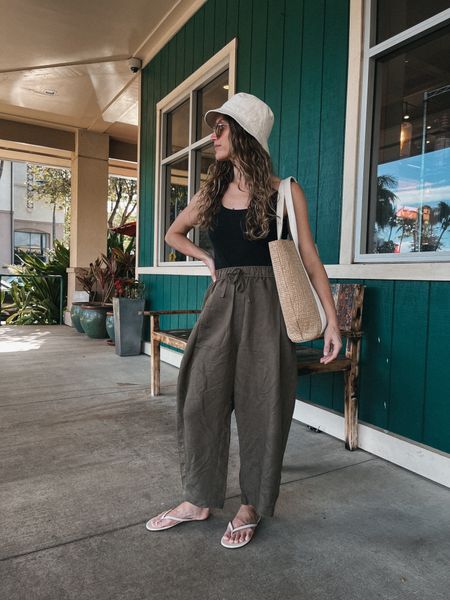 Vacation outfit

Bodysuit old from Everlane; similar options linked. Pants from Darling, sold out, similar linked. Tkees sandals, 7, I went up a half size. Amazon bag. Quince sunglasses. Madewell bucket hat  

#LTKtravel #LTKfindsunder100