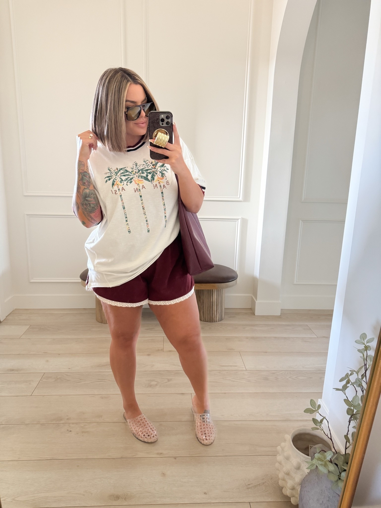 Top L it’s very oversized 
Shorts xl they have bike shorts built in.