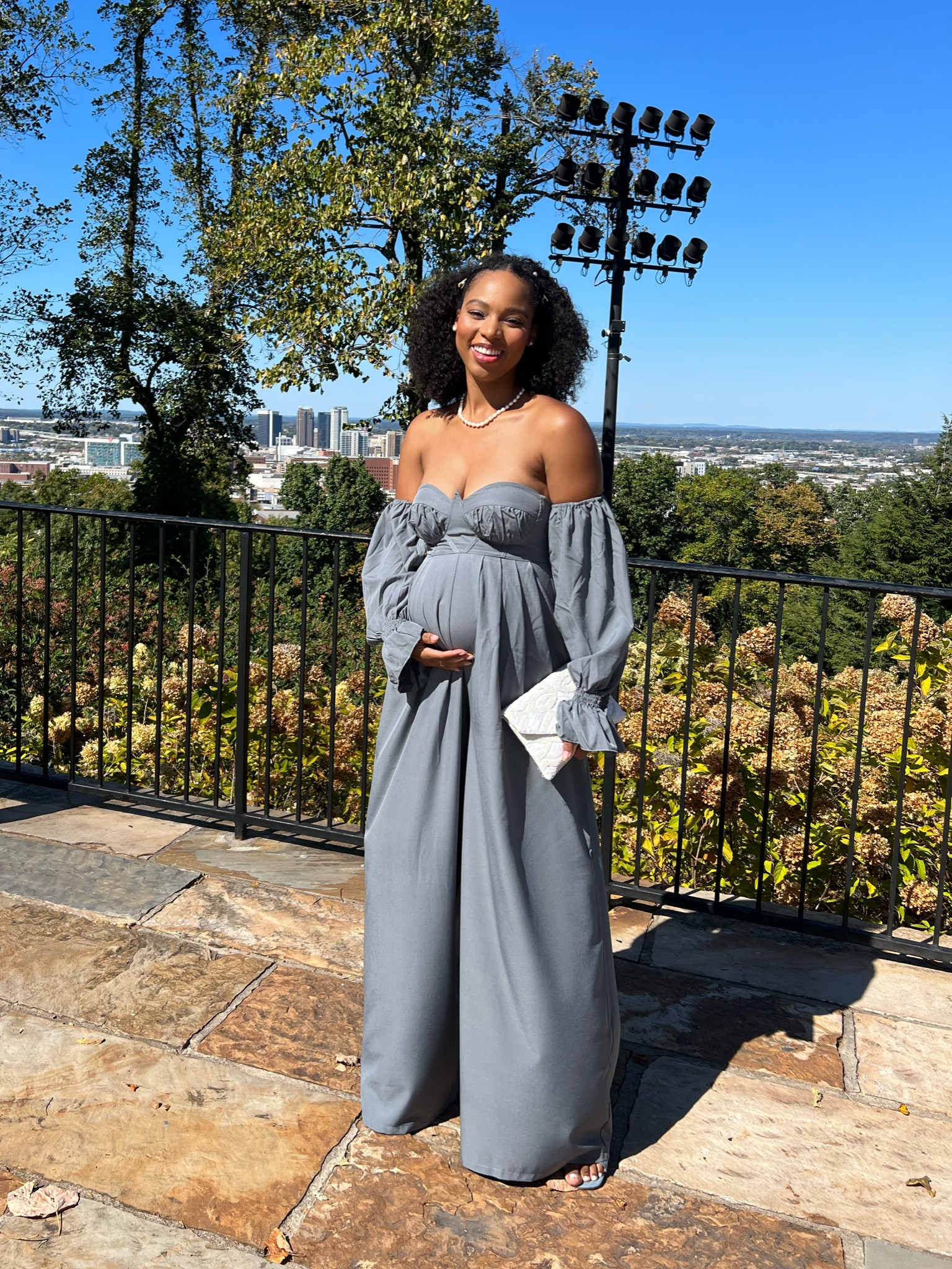 Bump friendly maternity wide leg off the shoulder jumpsuit for wedding guest or any formal or special occasion. Would be super cute for a baby shower or maternity photoshoot  

#LTKbump #LTKsalealert #LTKwedding