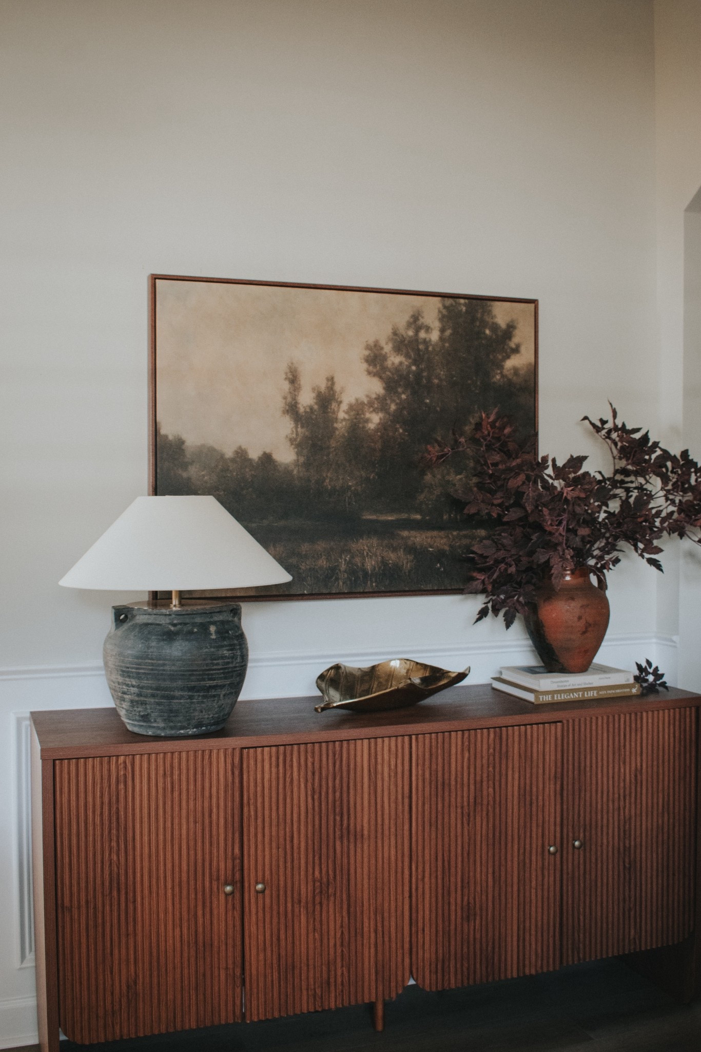 Sideboard styling. Cabinet styling. Budget cabinet. Rustic lamp. Vase lamp. Vintage inspired art  

#LTKHome #LTKSeasonal