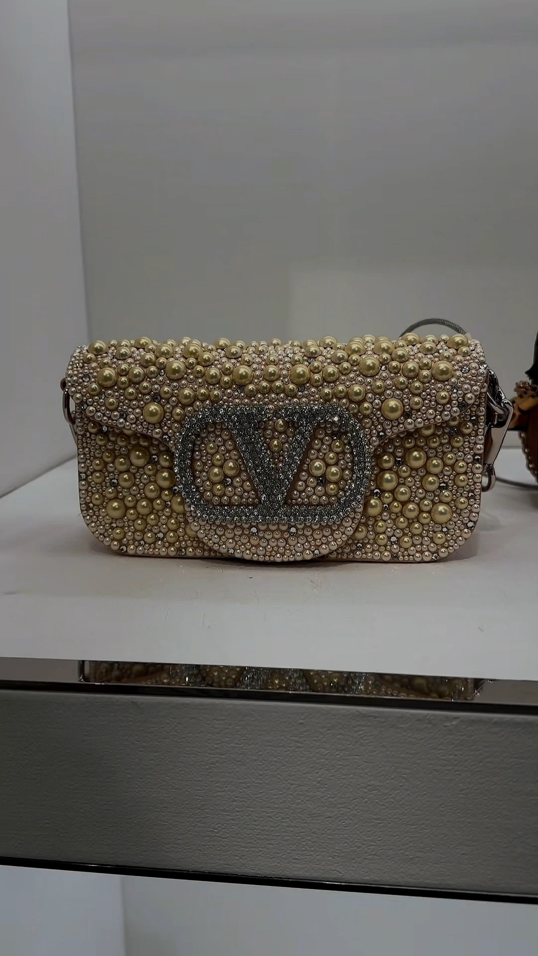 It’s wedding season💍💎

I saw the Valentino Garavani Loco Pearly Satin Shoulder Bag at Neiman Marcus and it immediately felt like a bridal moment. The pearl detailing with the crystal accents is so intricate and elegant. It truly looks like something you would carry on your wedding day.

For any bride-to-be, this would be such a beautiful statement piece for your ceremony or reception.

Not an everyday bag, but definitely one of those pieces you remember ✨

Shop the link in my bio

#LTKbridal
#LTKwedding
#LTKluxury
#LTKfinds
#LTKstyle