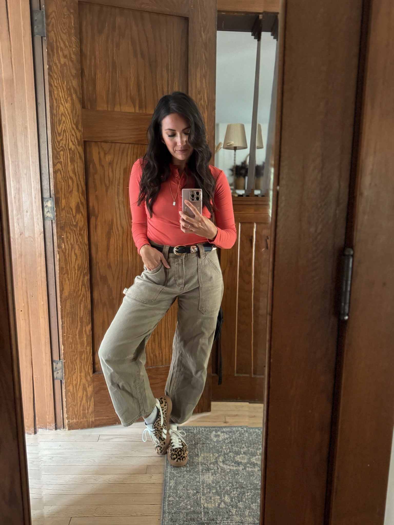 Sunday best, but make it comfortable ✨ This is what I wore to church today — a soft coral top tucked into barrel utility pants, cinched with a classic belt. I love pairing something tailored with playful sneakers (these leopard ones are such a fun touch 🐆) to keep the whole look effortless and true to me.

#LTKSeasonal #LTKStyleTip