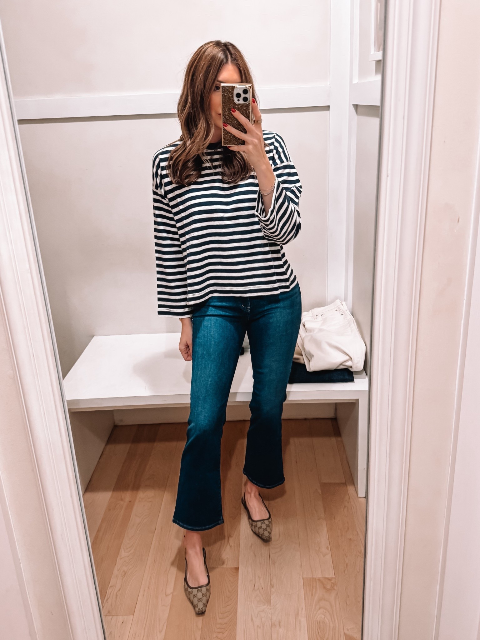 Small in tee, size 26 in jeans (need longer length) 