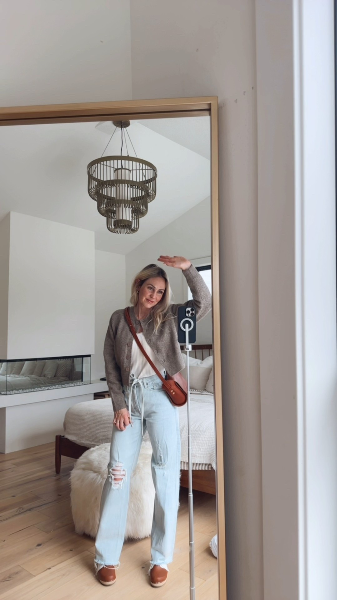 Light denim + white detailed long sleeve from Target + wool sweater from Zara 
@target @zara (sorry, I can’t link Zara)
Handbag is local from: Hanson Leather
Leather Swedish clogs. 

Everyday neutral outfit.
Cozy and cute.

I am 5’7” with heels on and these jeans are perfection!! 

#LTKTall #LTKmomlife #LTKOver40