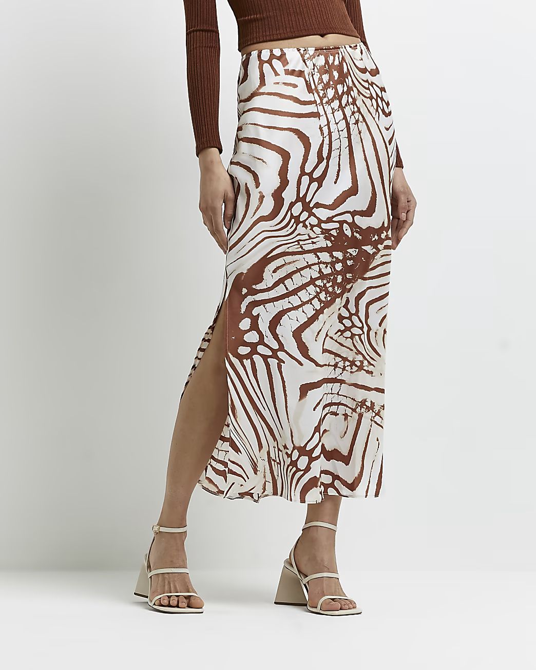 Beige animal print midi skirt | River Island (US)