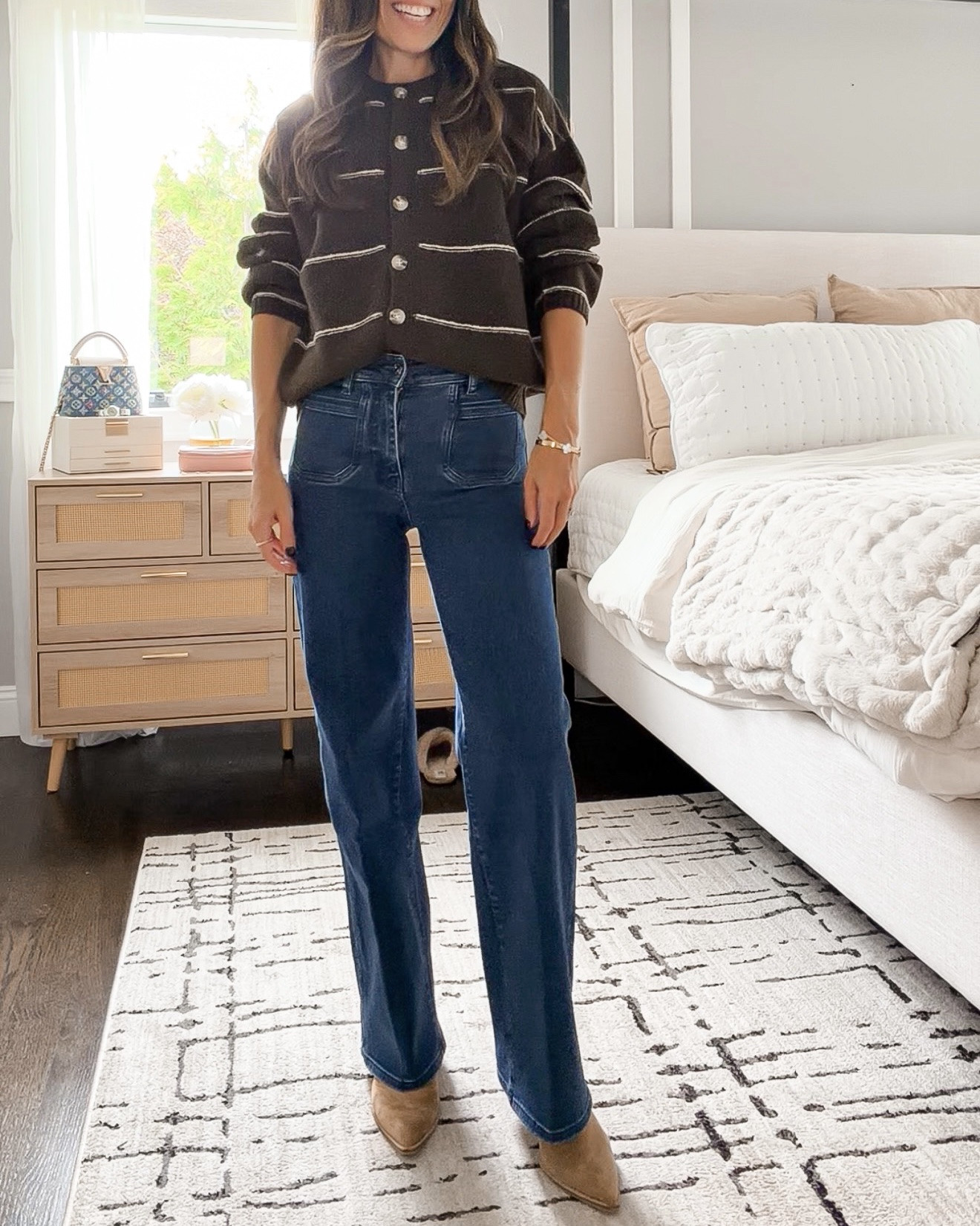 A dark cardigan and classic jeans are an easy outfit formula I always come back to. Add a simple top underneath and you’re ready to go!

Comment LINK and I’ll send you the details.

#LTKOver40 #LTKSeasonal #LTKootd