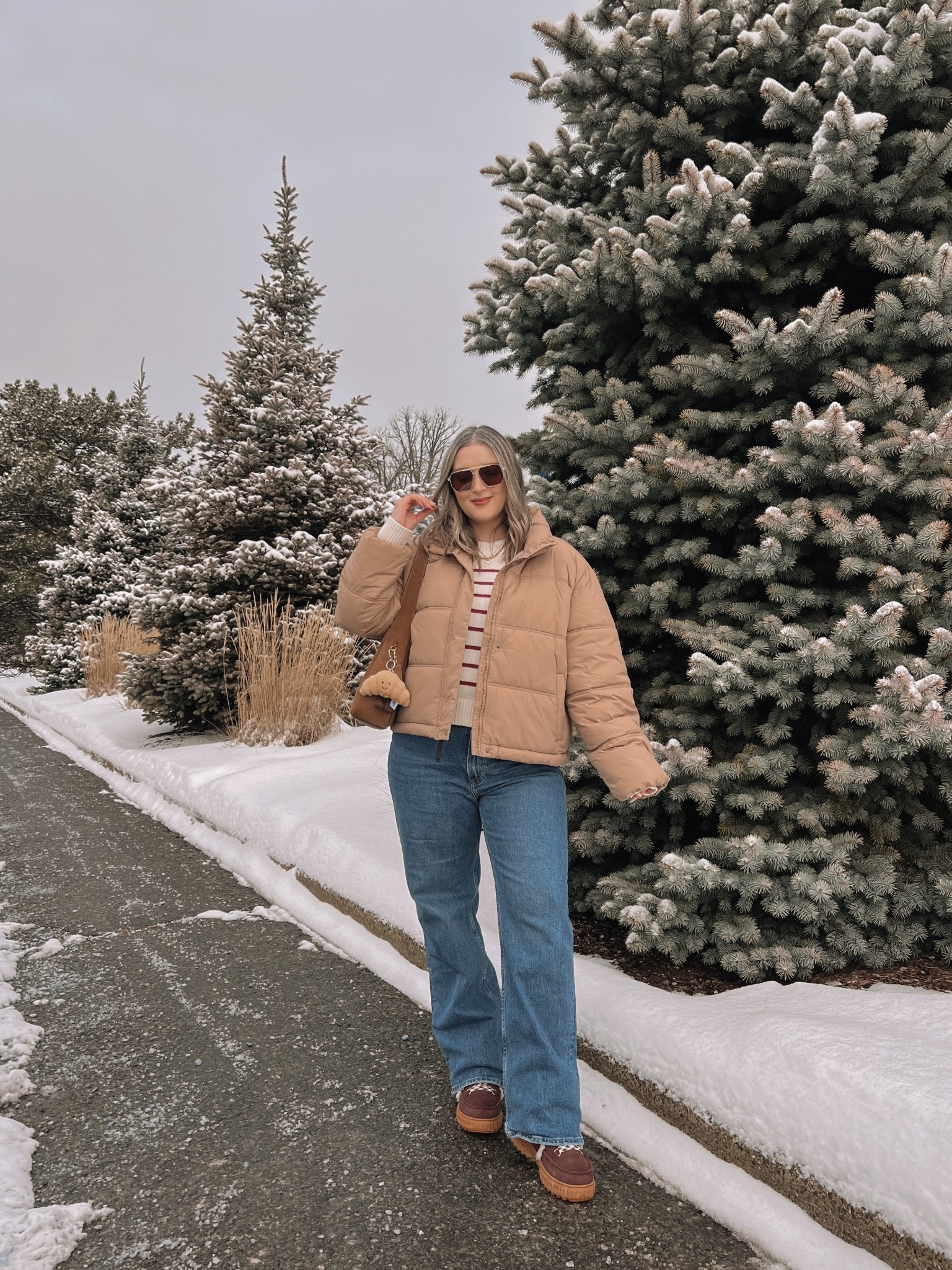 Winter ootd! Wearing my usual size L in the tan puffer jacket and striped sweater. These Abercrombie jeans are my all time fave! Wearing 32 for a looser fit. My Sorel snow boots are waterproof and so cozy, consider sizing up if you plan to wear thick socks. Canadian puffer jacket link under “similar products"


#LTKwinter #LTKjeans #LTKmidsize