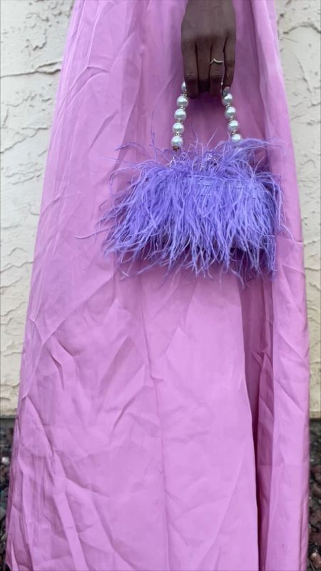 Purple, pearls, feathers oh MY! This bag from @amazon is one of my favorites EVER! It will spice up any outfit and provides that extra something we are all looking for. #amazon #amazonfind 

#LTKFind #LTKunder50 #LTKitbag