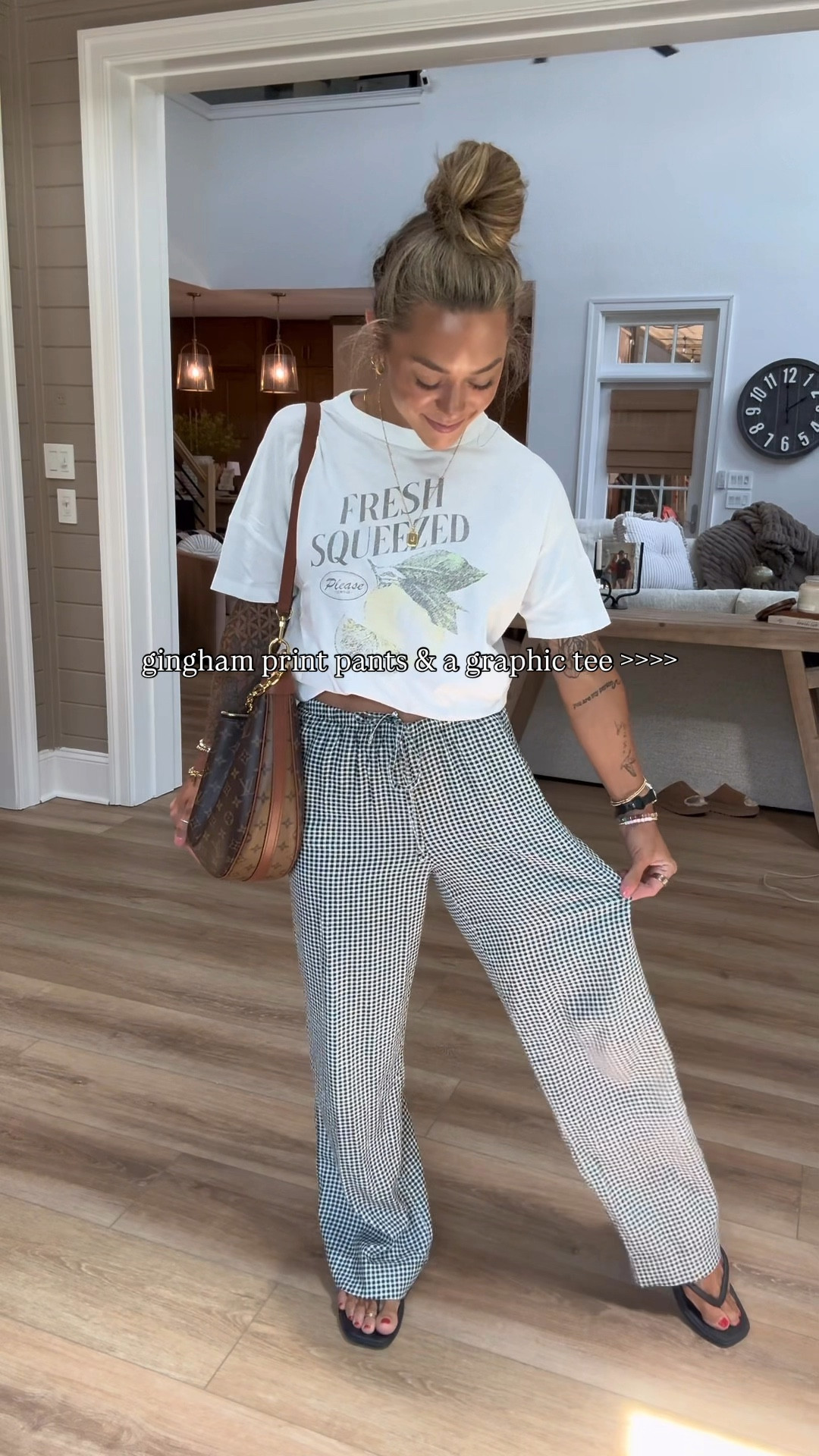 Having a moment for gingham print lately…🖤🙌🏼 casual OOTD even though the temp is in the 90°s here HAHA. 

Tee is old from Aerie but I linked their newer similar one🍋 use any of your fave tees! S / regular in the flowy pants! I’m 5’4!

Ootd / target / casual fit / cute / summer / American eagle / crocs sandals / Holley Gabrielle / reels / outfit inspo 

#LTKStyleTip #LTKFindsUnder50 #LTKFindsUnder100