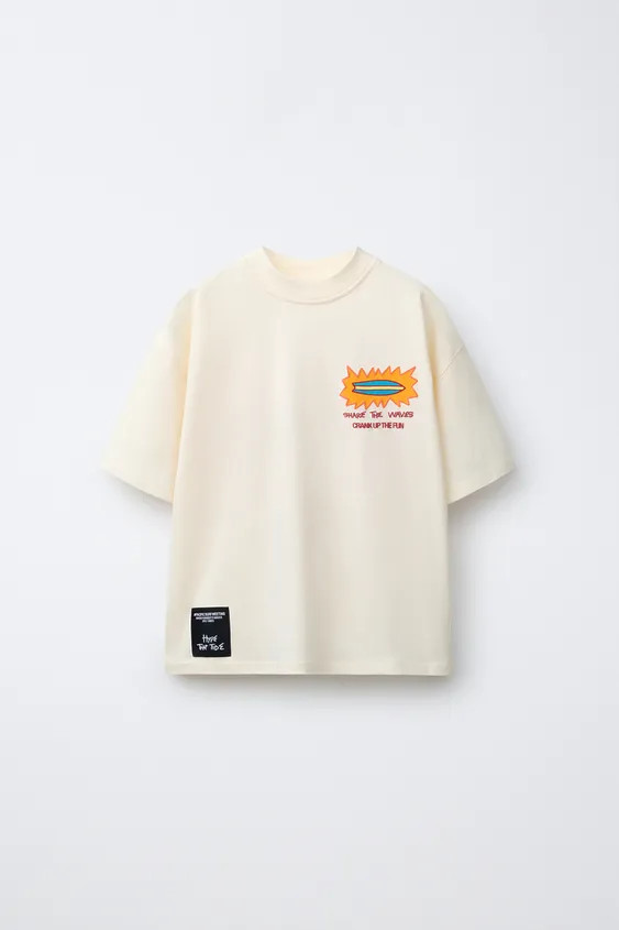 Short sleeve T-shirt with a round neck. Featuring a surf print on the chest and back, and a label... | Zara UK